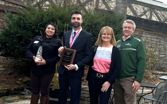 M State PTK All-Minnesota Academic Team honoree Andrew Averbeck, second from left, with chapter advisors Asenath Huether (left) and Michelle Ebsen, and M State Interim Dean of Student Affairs Scott Ebsen at PTK luncheon in Minneapolis on April 11.
