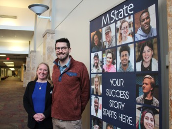 Amy Anderson and Ian Carlstrom, of the West Central Minnesota SBDC, pose for a picture outside their office on M State's Moorhead campus.