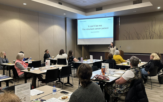 Attendees listen to a presenter at M State's Cancer Care Conference