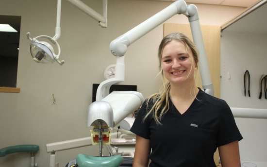 Hailey Millam Dental Assisting student, in uniform in class