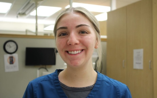 Kennedy  Fischer Dental Assisting student, in uniform in class