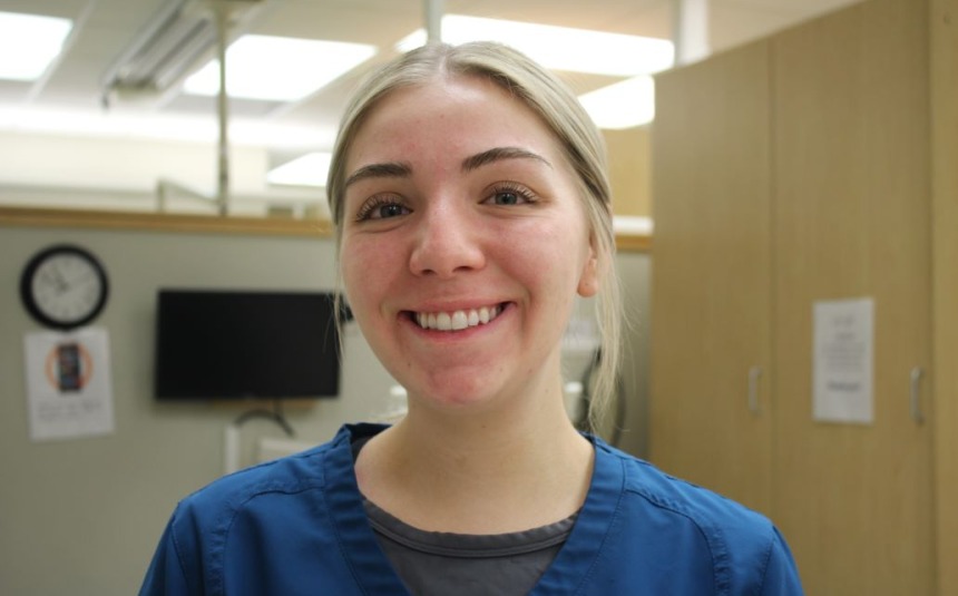 Kennedy  Fischer Dental Assisting student, in uniform in class