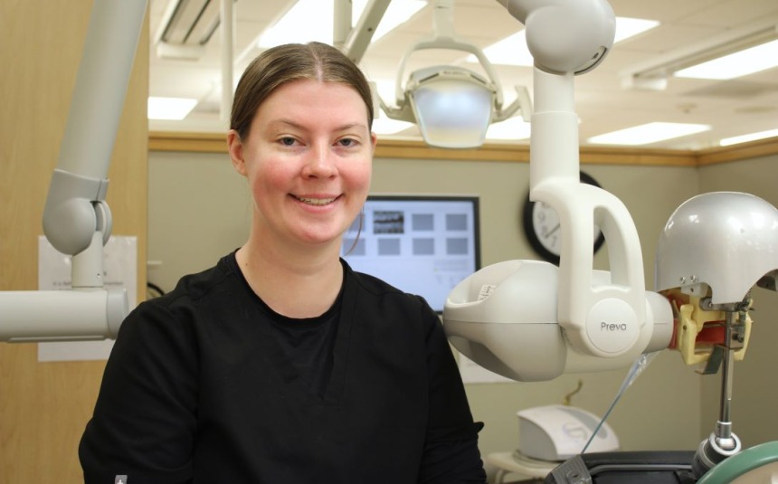 Skyler Rathcke Dental Assisting student, in uniform in class